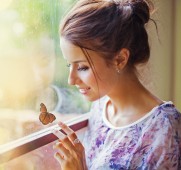 Beautiful woman with butterfly